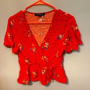 Low cut peplum shirt